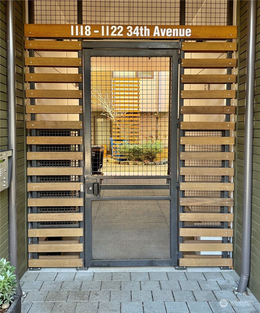 Photo of 1120 34th Avenue #A, Seattle, WA 98122 (MLS # 2321845)