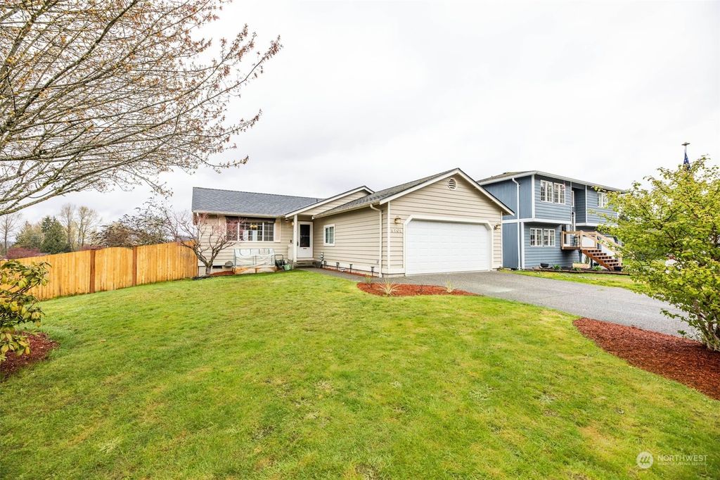 Photo of 9701 SE 9th Place Pl, Lake Stevens, WA 98258 (MLS # 2221479)