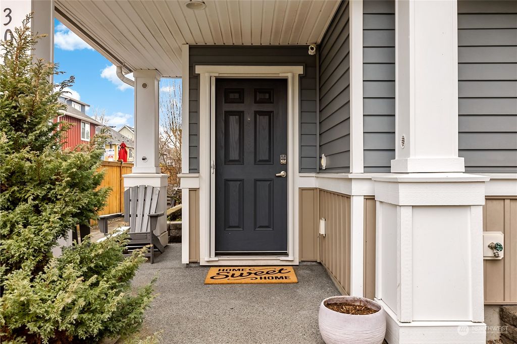 Photo of 3008 SW Bataan Street, Seattle, WA 98126 (MLS # 2032363)