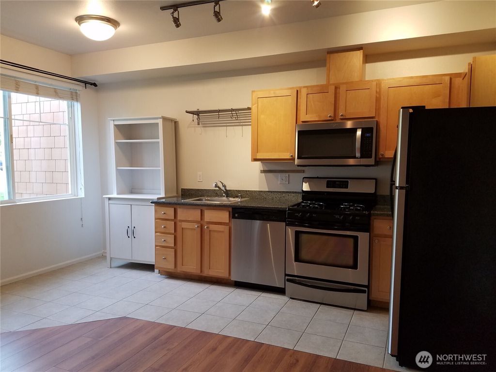 Photo of 564 225th Lane NE #A102, Sammamish, WA 98074 (MLS # 2459508)