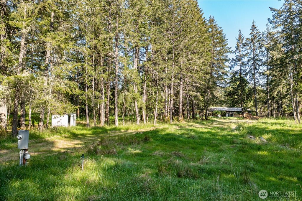 Photo of 905 E Madrona Boulevard NW, Lakebay, WA 98349 (MLS # 2521294)
