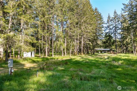 Photo of 905 E Madrona Boulevard NW, Lakebay, WA 98349 (MLS # 2521294)