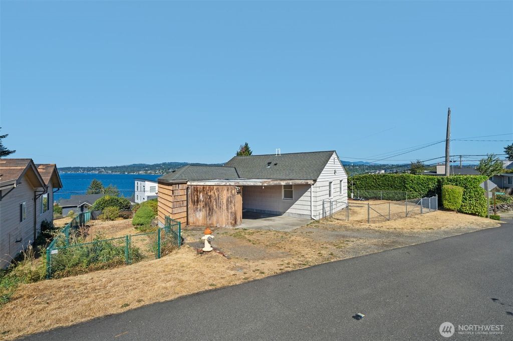 Photo of 10658 Laurel Lane S, Seattle, WA 98178 (MLS # 2417906)