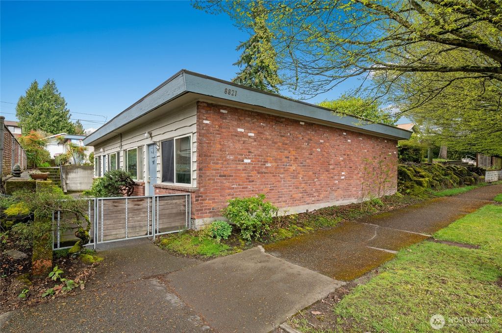 Photo of 8821 35th Avenue SW, Seattle, WA 98126 (MLS # 2362878)