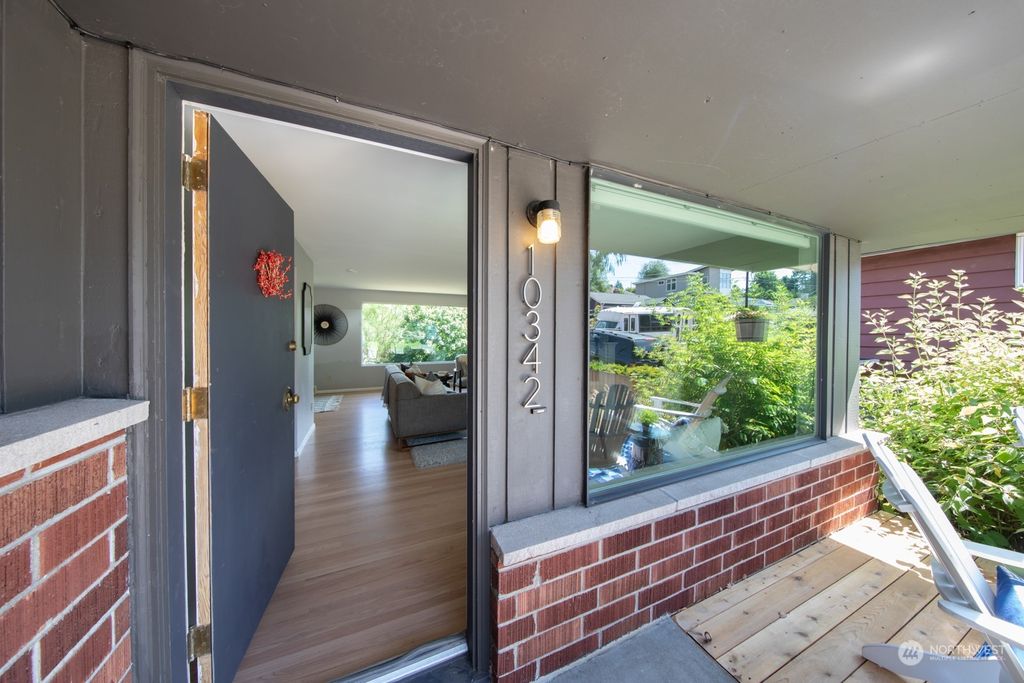 Photo of 10342 9th Avenue NW, Seattle, WA 98177 (MLS # 2141714)