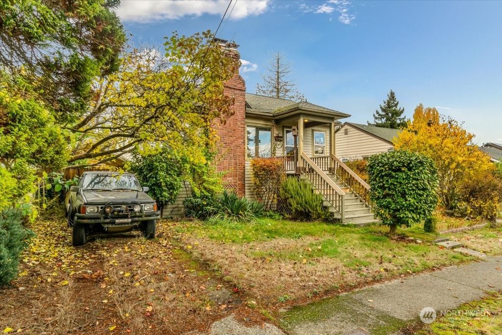 Photo of 730 N 98th Street, Seattle, WA 98103 (MLS # 2310079)