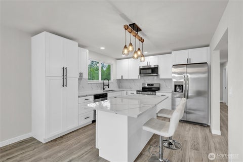 Photo of 20001 2 208th Avenue SE, Renton, WA 98058 (MLS # 2580619)