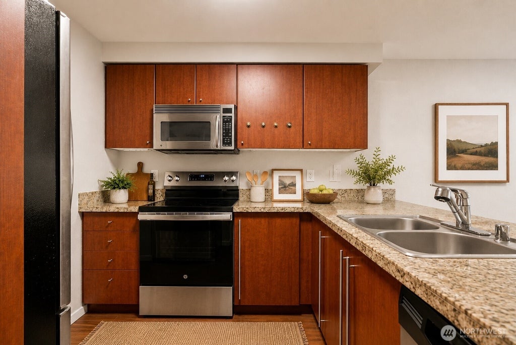 Photo of 11309 NE 128th Street #F104, Kirkland, WA 98034 (MLS # 2560562)