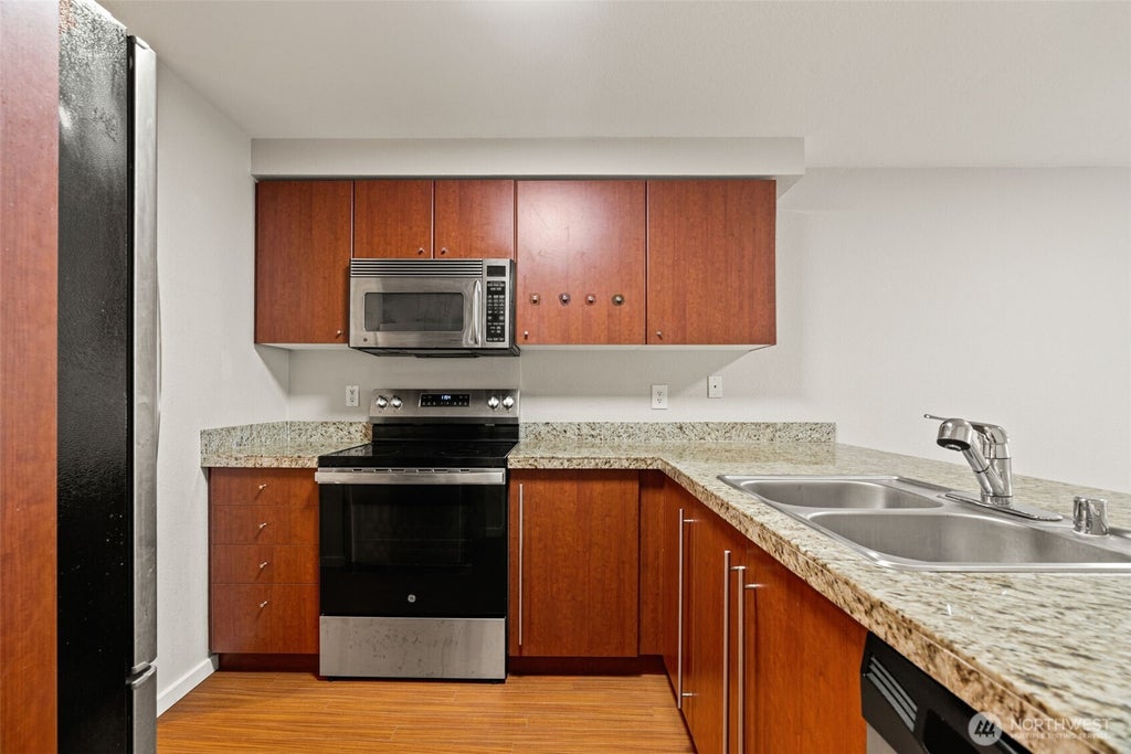 Photo of 11309 NE 128th Street #F104, Kirkland, WA 98034 (MLS # 2560562)