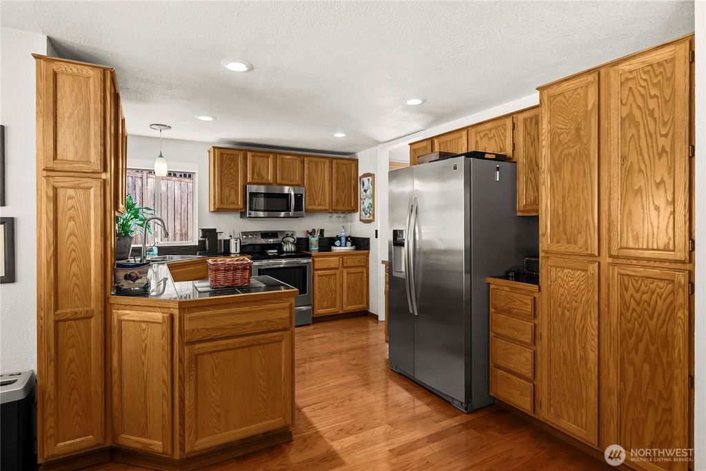 Photo of 930 51st Street SE, Auburn, WA 98092 (MLS # 2503415)