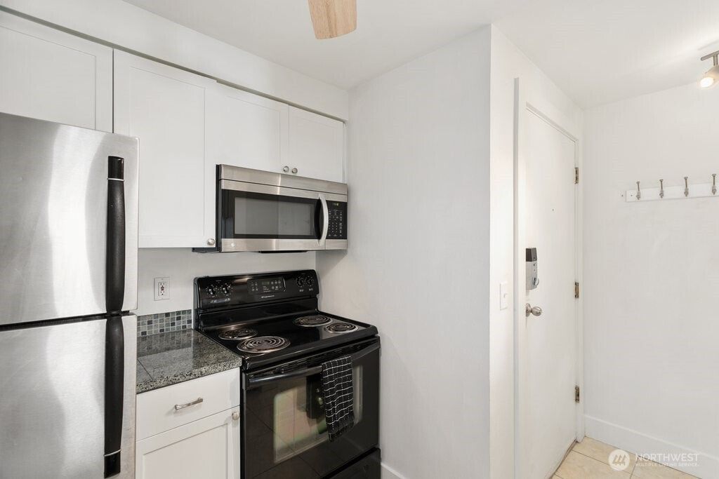 Photo of 4831 Fauntleroy Way SW #206, Seattle, WA 98116 (MLS # 2474680)