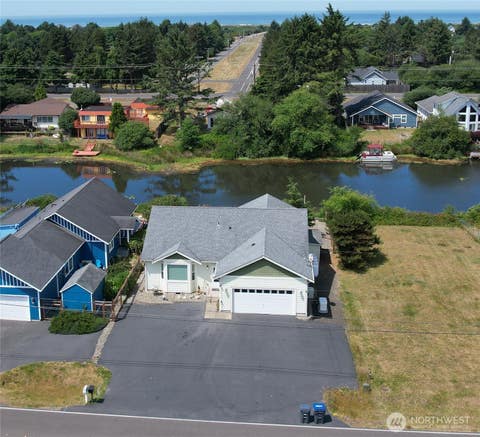 Photo of 393 Canal Drive NE, Ocean Shores, WA 98569 (MLS # 2558525)