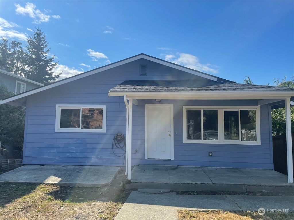 Photo of 5617 25th Avenue SW, Seattle, WA 98106 (MLS # 2059853)