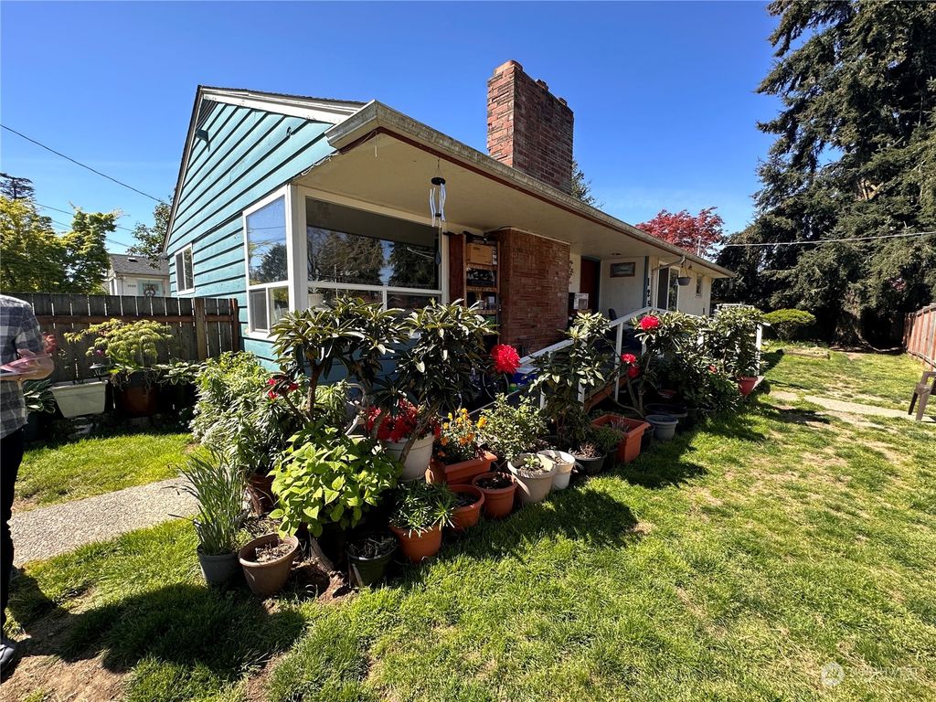 Photo of 125 N 132nd Street, Seattle, WA 98133 (MLS # 2135680)