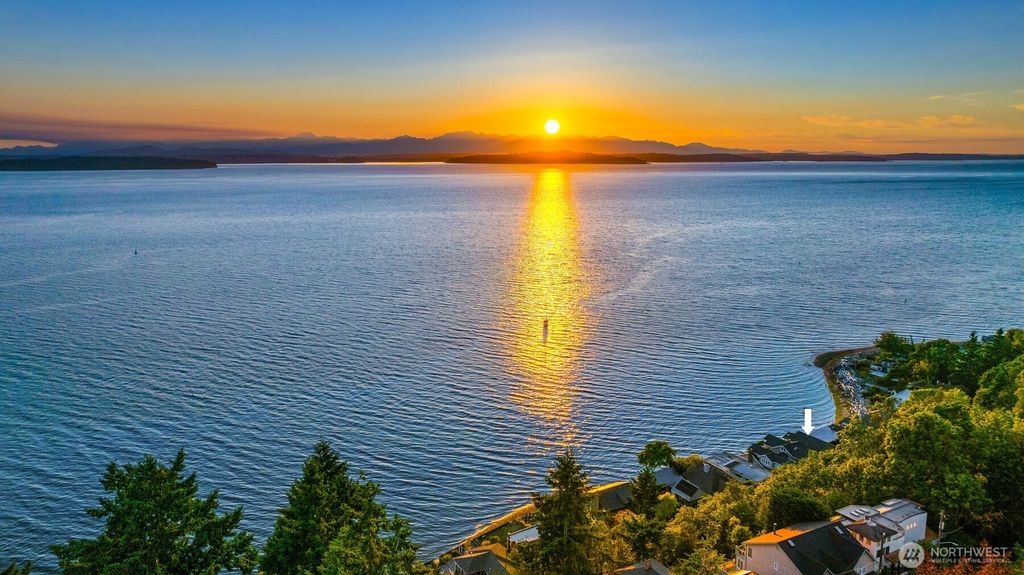 Photo of 7117 Beach Drive SW, Seattle, WA 98136 (MLS # 2402626)