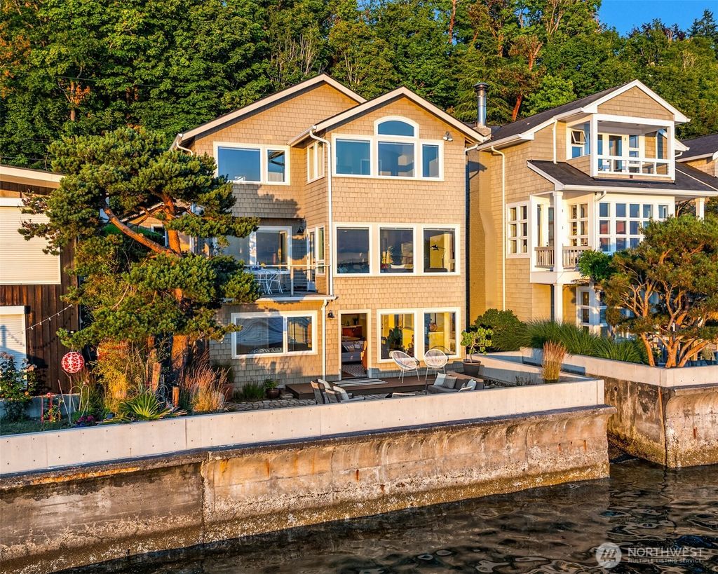 Photo of 7117 Beach Drive SW, Seattle, WA 98136 (MLS # 2402626)