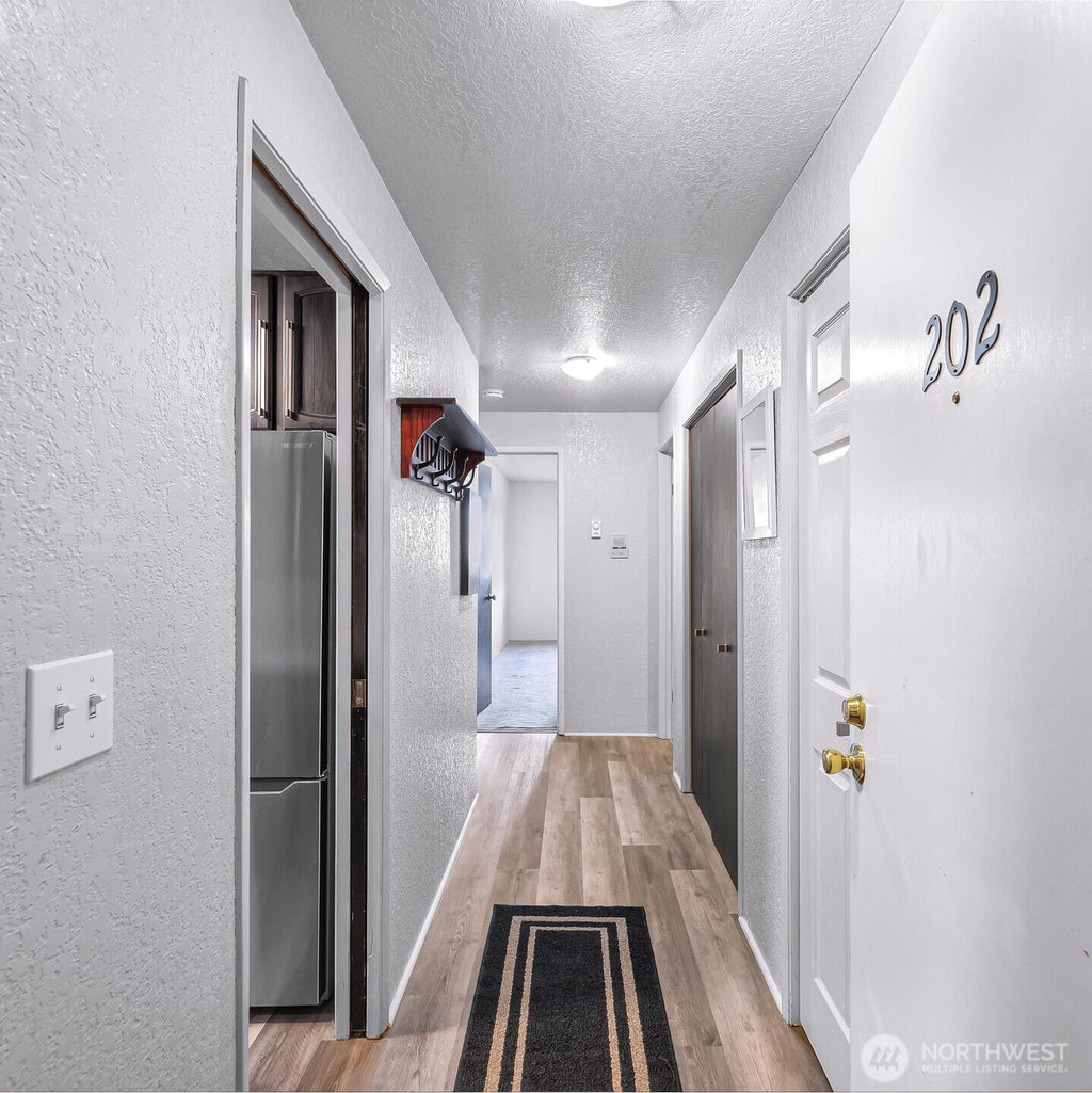 Photo of 12035 32nd Avenue NE #202, Seattle, WA 98125 (MLS # 2588461)