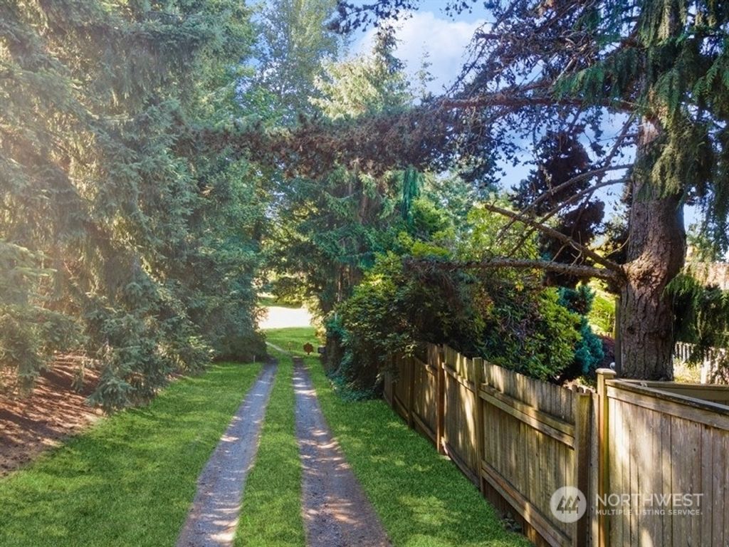 Photo of 10205 NE 116th Street, Kirkland, WA 98034 (MLS # 2140472)