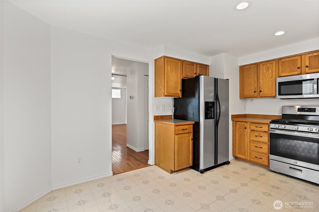 Photo of 12042 31st Avenue NE, Seattle, WA 98125 (MLS # 2561946)