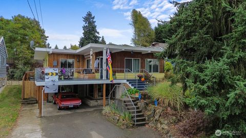 Photo of 9840 26th Avenue SW, Seattle, WA 98106 (MLS # 2443525)