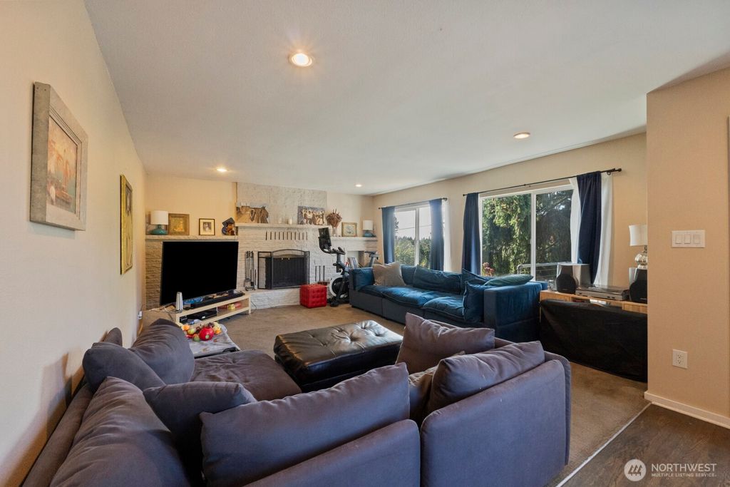 Photo of 9840 26th Avenue SW, Seattle, WA 98106 (MLS # 2443525)