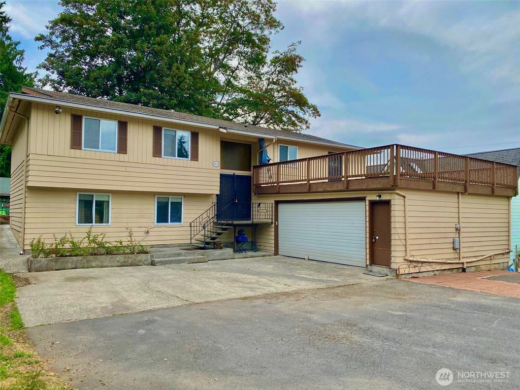 Photo of 4825 S Graham Street, Seattle, WA 98118 (MLS # 2427467)