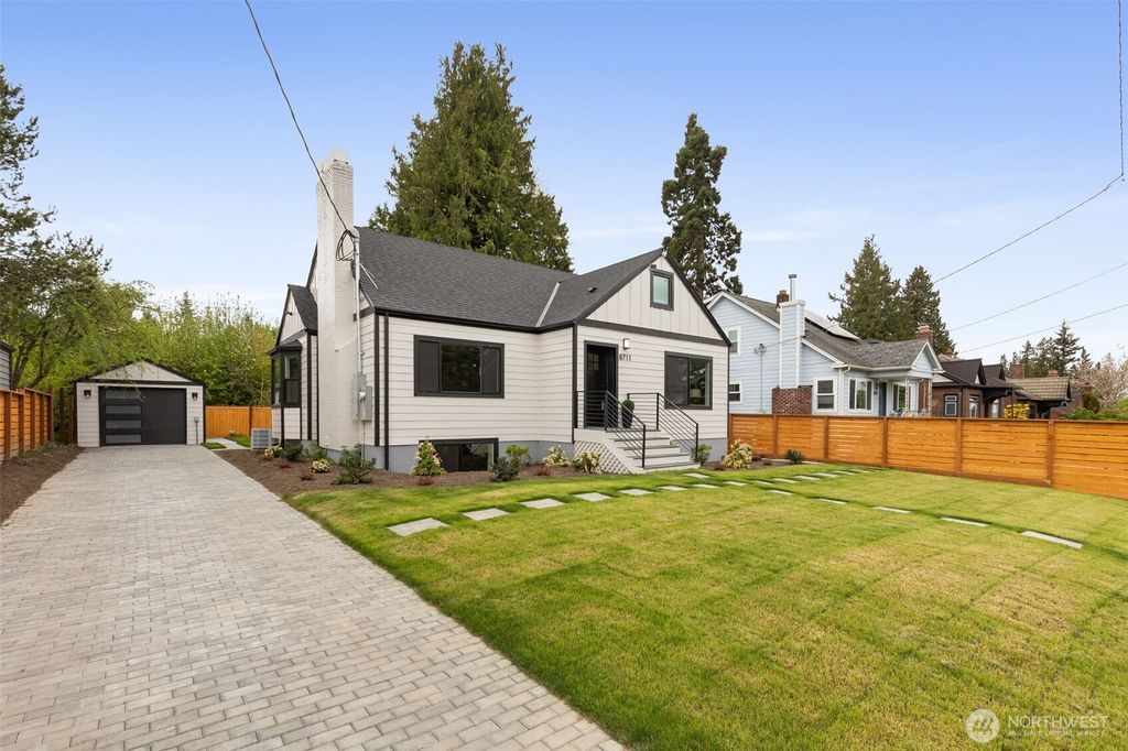 Photo of 8711 28th Avenue NW, Seattle, WA 98117 (MLS # 2515813)