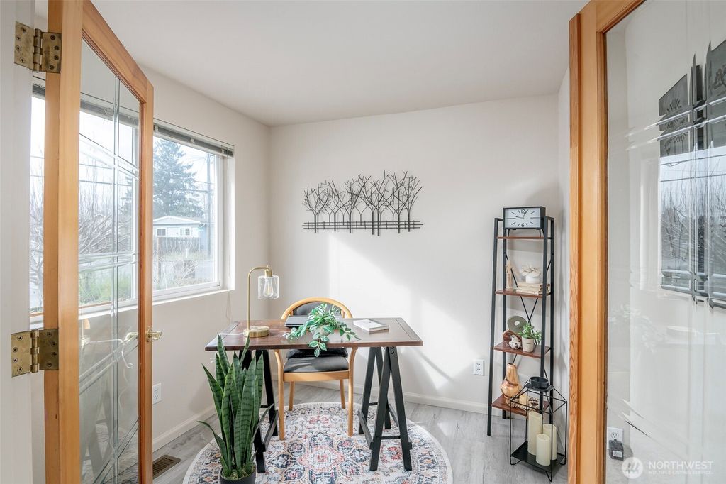 Photo of 2604 NE 7th Street, Renton, WA 98056 (MLS # 2479428)