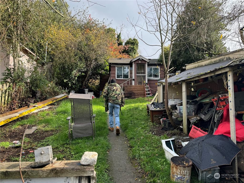 Photo of 9616 11th Avenue SW, Seattle, WA 98106 (MLS # 2251314)