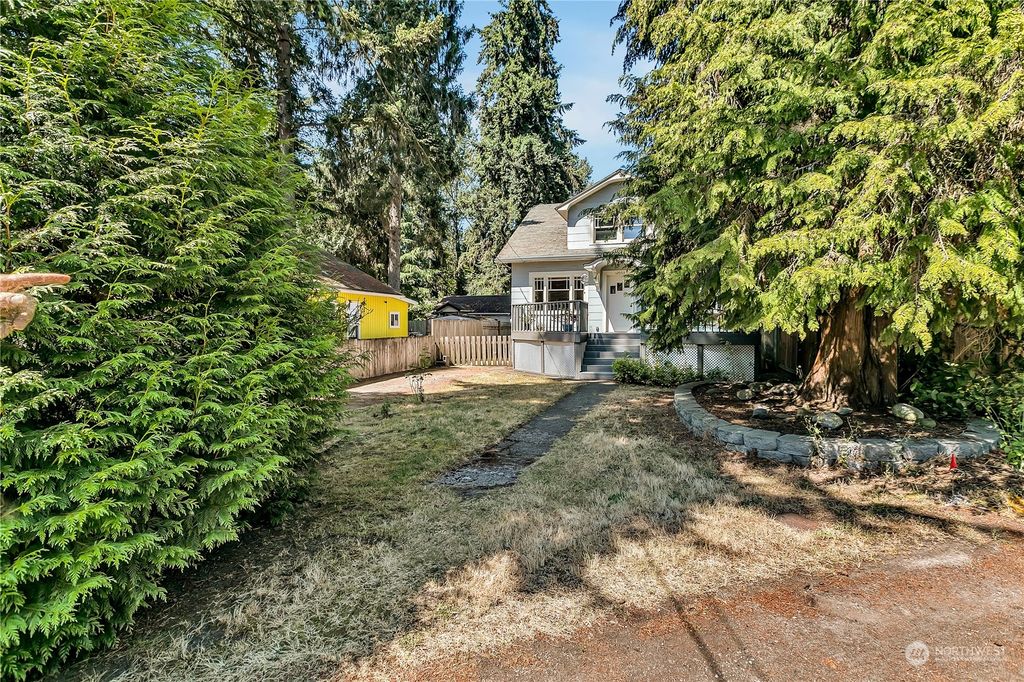 Photo of 12053 Hiram Place NE, Seattle, WA 98125 (MLS # 2262697)