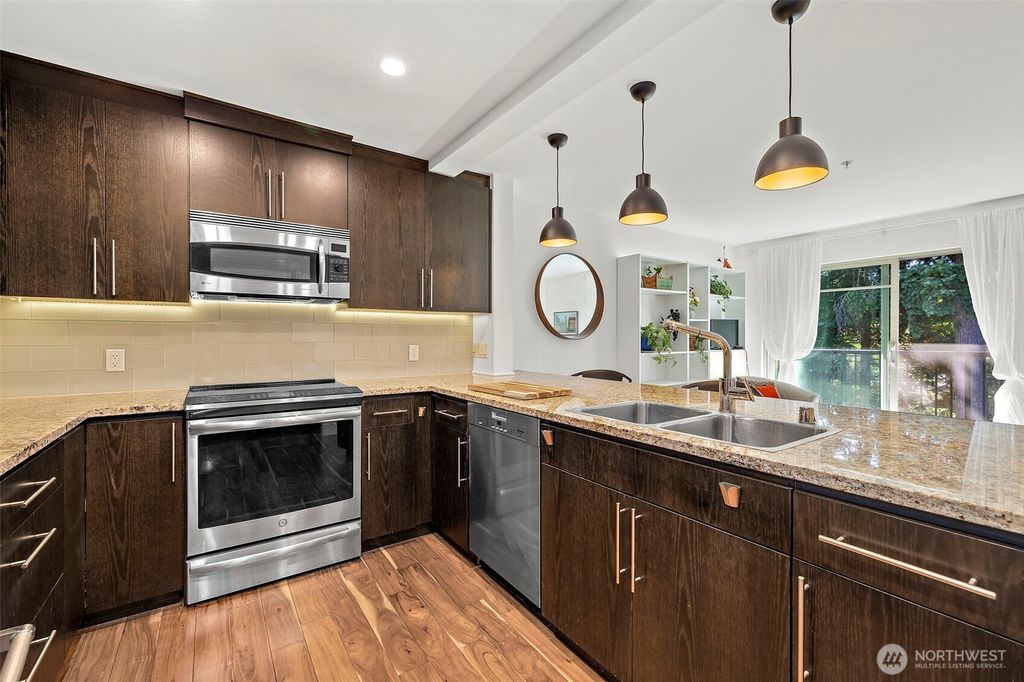 Photo of 511 100th Avenue NE #305, Bellevue, WA 98004 (MLS # 2425606)