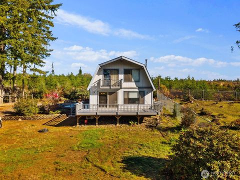 Photo of 350 Olympic Drive E, Grapeview, WA 98546 (MLS # 2447788)