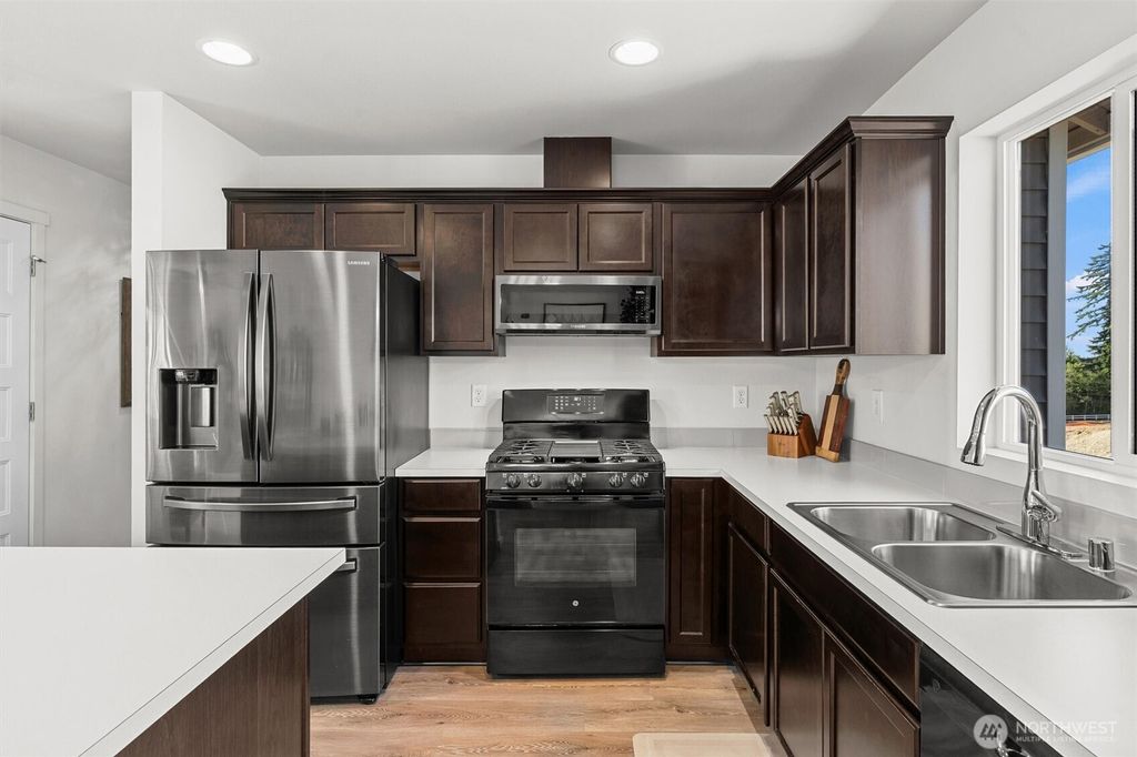 Photo of 8343 39th Place NE, Marysville, WA 98270 (MLS # 2410867)