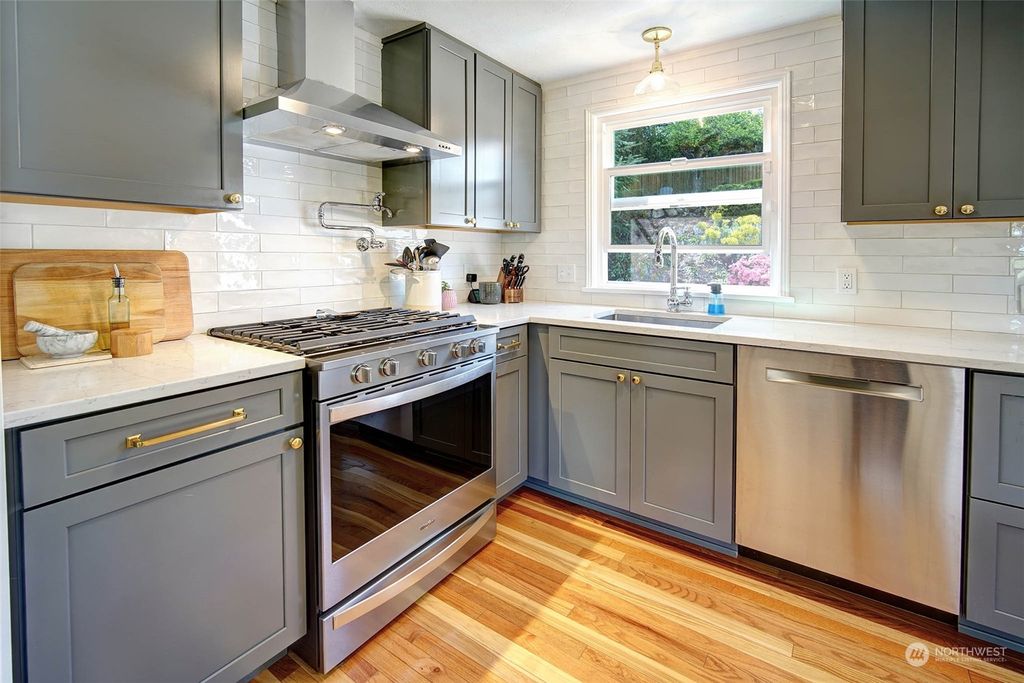 Photo of 7509 29th Avenue SW, Seattle, WA 98126 (MLS # 2232103)