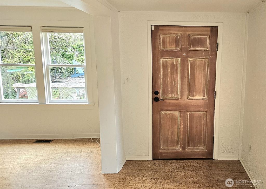 Photo of 10741 Palatine Avenue N, Seattle, WA 98133 (MLS # 2494376)