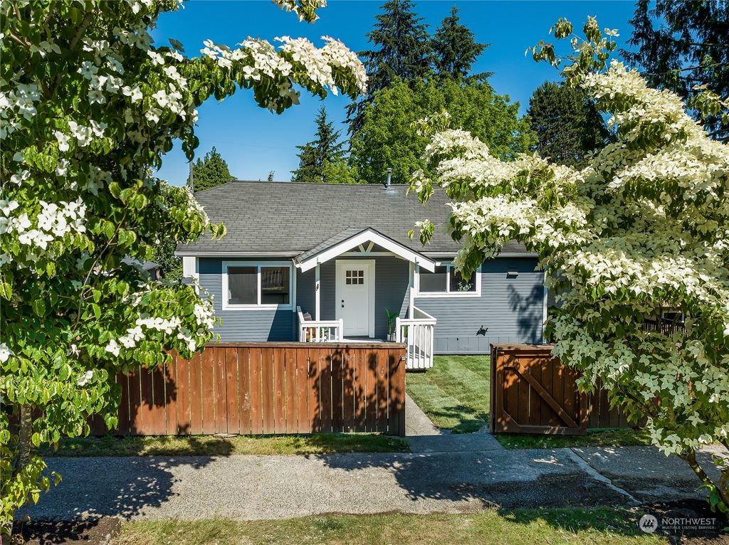 Photo of 8826 32nd Avenue SW, Seattle, WA 98126 (MLS # 2256402)