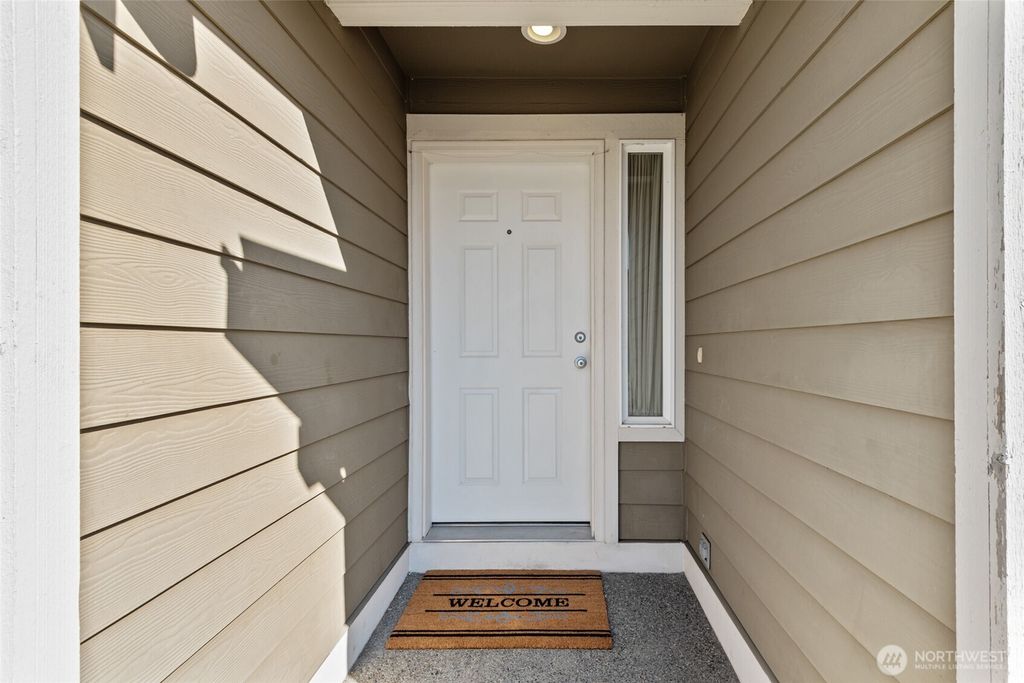 Photo of 10702 SE 273rd Court, Kent, WA 98030 (MLS # 2361929)