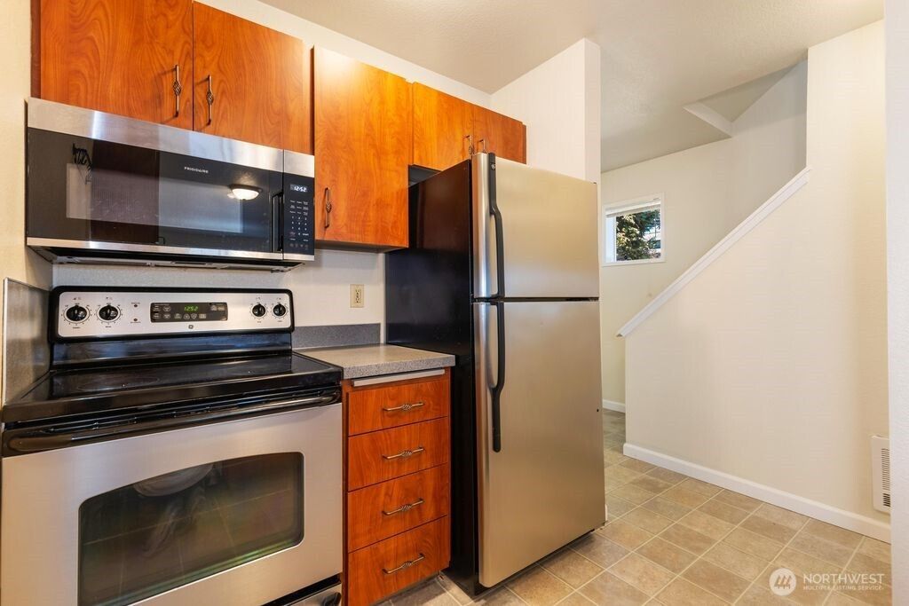 Photo of 1727 NW 61st Street, Seattle, WA 98107 (MLS # 2413741)