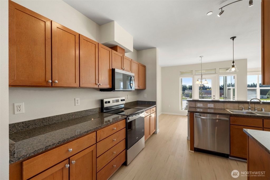 Photo of 7104 265th Street NW #415, Stanwood, WA 98292 (MLS # 2444801)