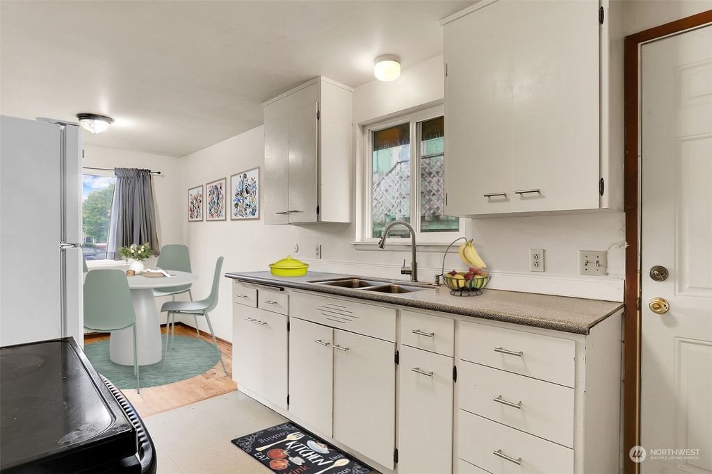 Photo of 8649 Renton Avenue S, Seattle, WA 98118 (MLS # 2310541)
