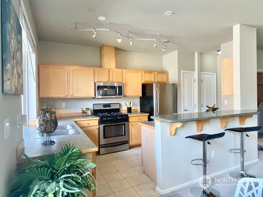 Photo of 564 225th Lane NE #A304, Sammamish, WA 98074 (MLS # 2053027)