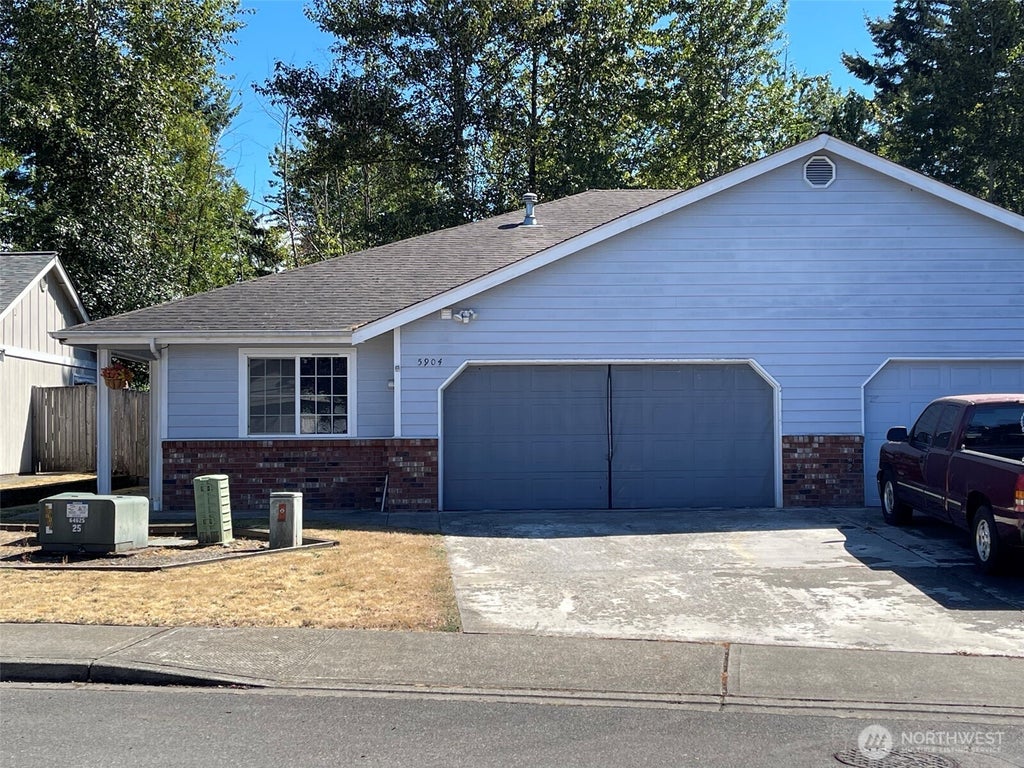Photo of 5902 115th Street E, Puyallup, WA 98373 (MLS # 2563334)