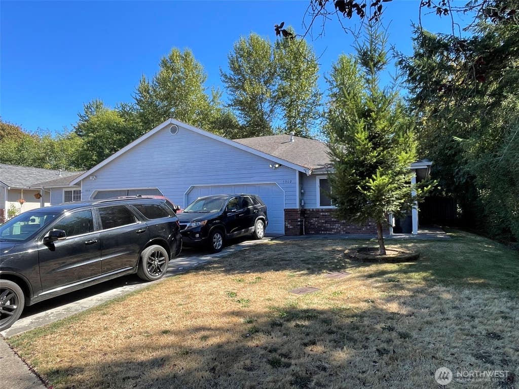 Photo of 5902 115th Street E, Puyallup, WA 98373 (MLS # 2563334)