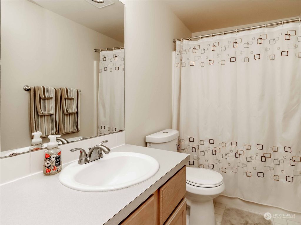 Photo of 10509 SE 250th Place #D103, Kent, WA 98030 (MLS # 2326240)