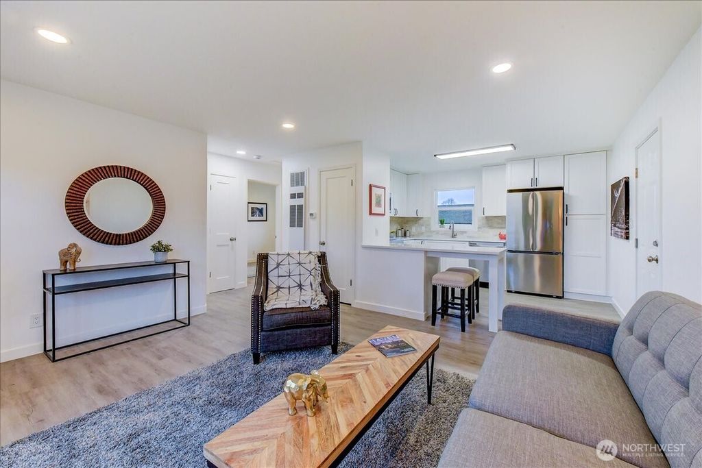 Photo of 9320 31st Place SW, Seattle, WA 98126 (MLS # 2485481)