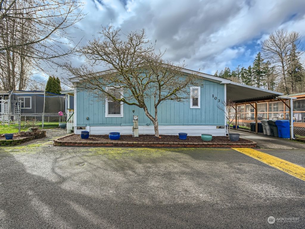 Photo of 15410 SE 272nd Street #103, Kent, WA 98042 (MLS # 2036370)