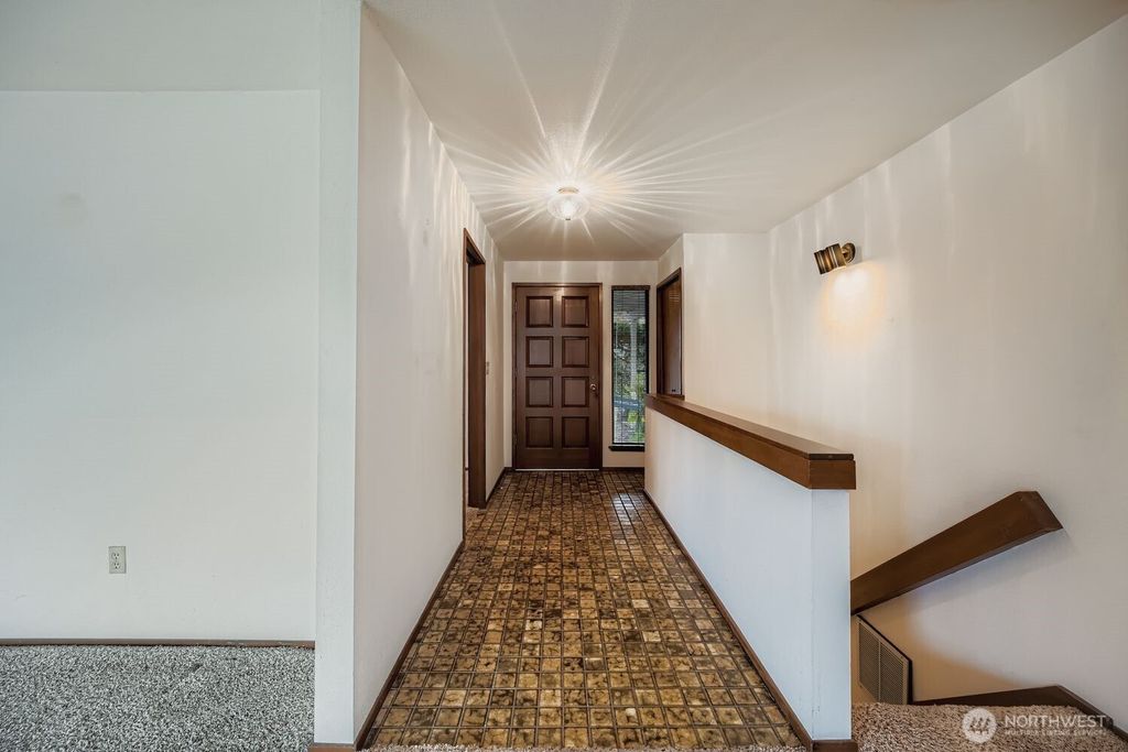 Photo of 11047 26th Avenue SW, Seattle, WA 98146 (MLS # 2454915)