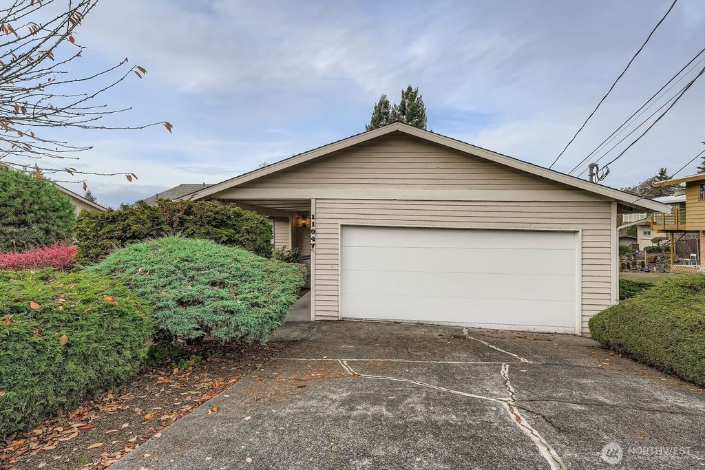Photo of 11047 26th Avenue SW, Seattle, WA 98146 (MLS # 2454915)