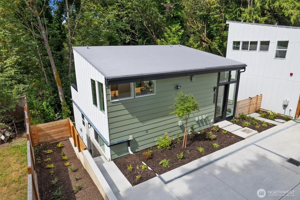 Photo of 12009 36th Avenue NE, Seattle, WA 98125 (MLS # 2332841)