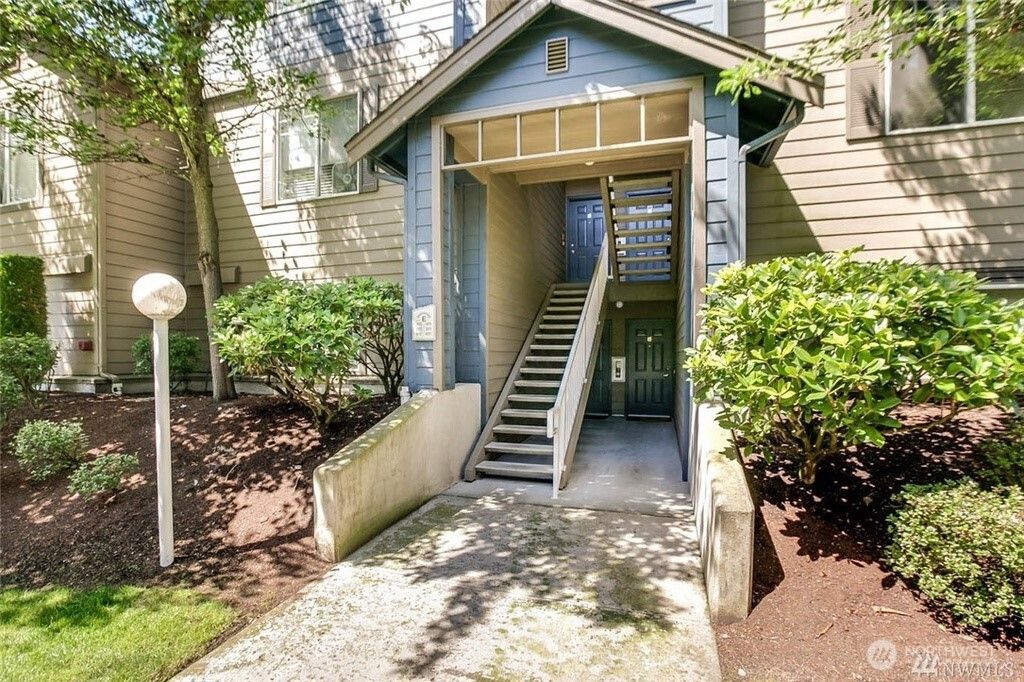 Photo of 10825 SE 200th Street #H201, Kent, WA 98031 (MLS # 2390437)
